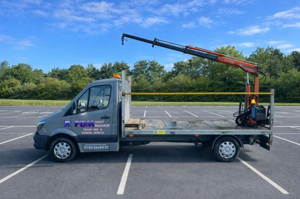 Pick up with detachable crane & towing capability.
